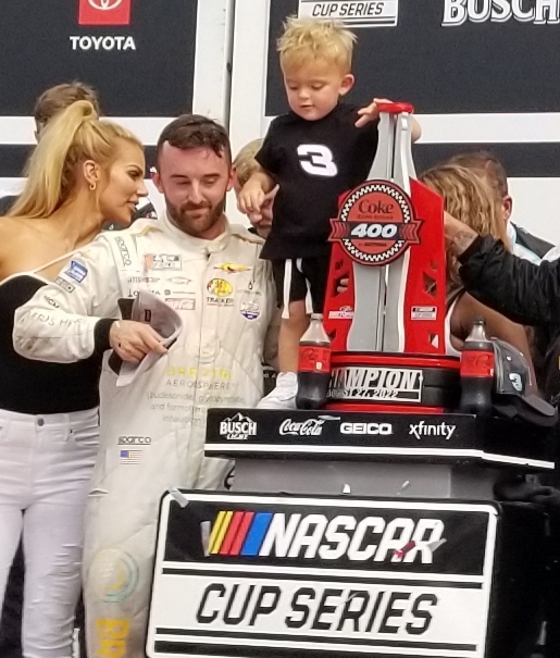 ClaireBLang's tweet photo. When I say lil' Ace Dillon was all over it in Victory Lane .....I mean ALL over it! He had such fun aft daddy @austindillon3 win! Vic Lane is such a fun place...but the kids take it over the top!! @SiriusXMNASCAR https://t.co/yohODkzrBA