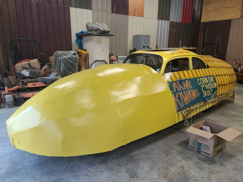 CWCHS's tweet photo. CWCHS senior art student Katelyn Niehaus volunteered her time to repaint the Corn Car for Kiwanis to be featured in the upcoming Corn Day Parade. The car was originally painted by another CWC student, Kelsey Maloy in 2005.  Awesome job, Katelyn! https://t.co/tsMkXHwcTY