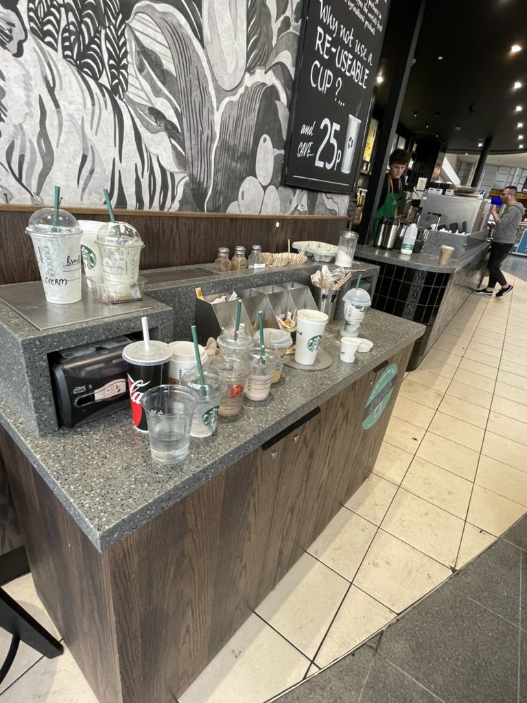 Hasnatraza's tweet photo. Manchester piccadilly @StarbucksUK  this is an absolute mess. Not even a busy day and plenty staff on. Cant even get condiments without dirty cups ! Shocking https://t.co/8IodUwNBDL