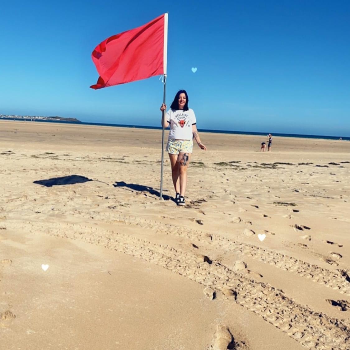 Mrskhardman's tweet photo. Baby didn’t I tell you I was a red flag 🚩 😂💋 #cornwallbeach https://t.co/DPj7jrAahs