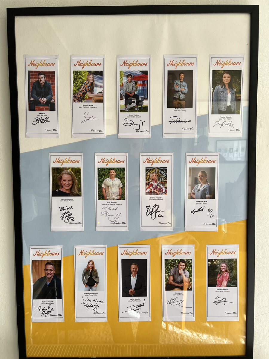 trotteruk's tweet photo. Thanks to my fiancé Joe for framing my #Neighbours signed cards. Our lounge is like a Neighbours shrine now 😂 

@benhall23 @georgiestone16 @CowdenLucinda @CintaStapleton @relmaloglou @Tim_Kano @jemmadono @AprilRPengilly @MattyWilson88 @takayahonda @canleask (&amp; everyone else!) 🧡 https://t.co/t3EFIGzevt