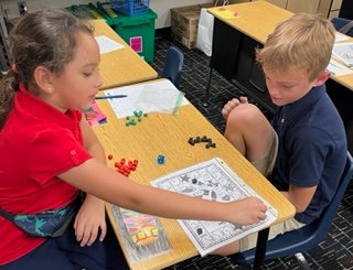 Trad_Bellair's tweet photo. 3rd grade students are practicing math and telling time with their partners at The Traditional Academy at Bellair. #SoaringtoExtraordinaryHeightsTogether @DVUSD https://t.co/0oHjFIriij