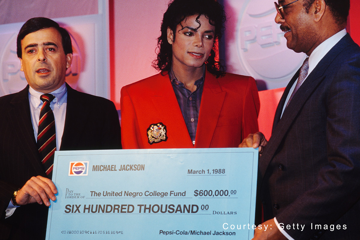 The107_hbcu's tweet photo. Remembering Michael Jackson on what would have been his 64th birthday.  
Images: Wearing @HowardU cardigan
Donating $600K to @UNCF 
Receiving honorary doctorate from @Fisk1866 https://t.co/Y6KjA8b1jj