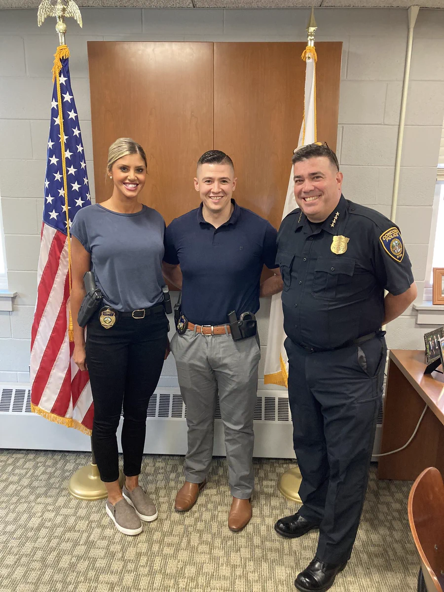 Photo New Detectives Cara Paladino and Derek Rodriguez with Chief Joseph O’Connor