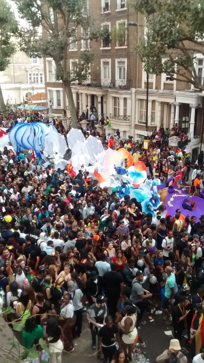 As the Carnival starts to wind down, the incredible costumes of Mahogany Mas band parade & float down Ladbroke Grove - will they win competition again? - to gasps & cheers from the revellers. The cloud elephant 100% crowd pleaser -Fantastic!