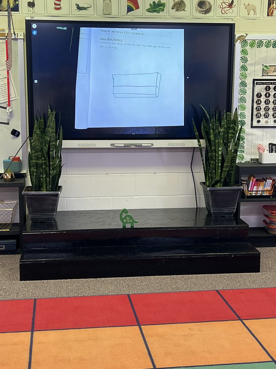 Holli_Sears's tweet photo. Scientists observe and draw what they see! Ms. Schroader and her kindergarten scientists are practicing observing and drawing accurately @NSDCarver with a dinosaur friend. @NeoshoSD https://t.co/APZLKXCNlY