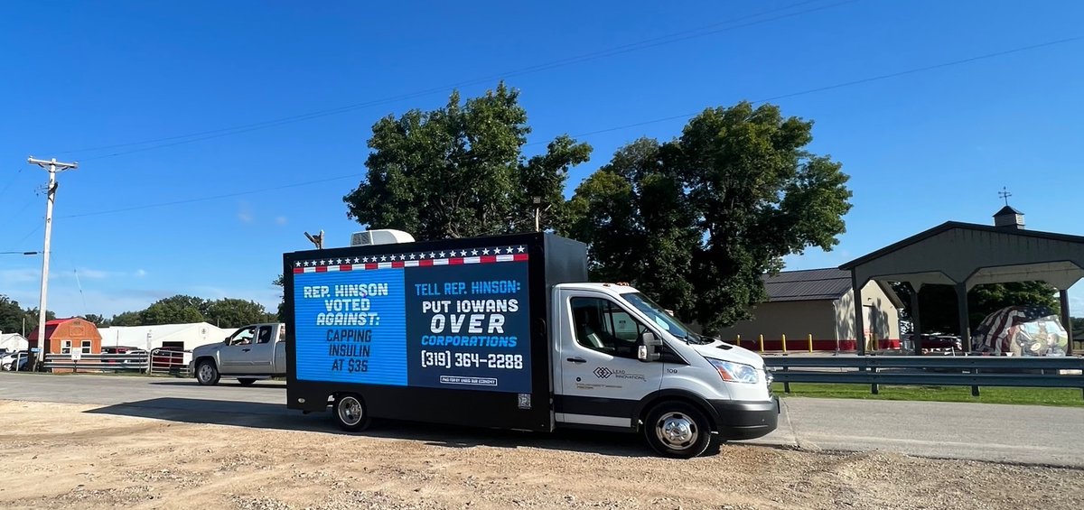 UnrigOurEconomy's tweet photo. Rep. Hinson was a no-show at our town hall last week.

So Unrig Our Economy Iowa flew a banner and drove a mobile billboard by her BBQ to hold her accountable for her votes siding with corporations over her constituents— including her vote against the Inflation Reduction Act. https://t.co/4EqRzNbOOn