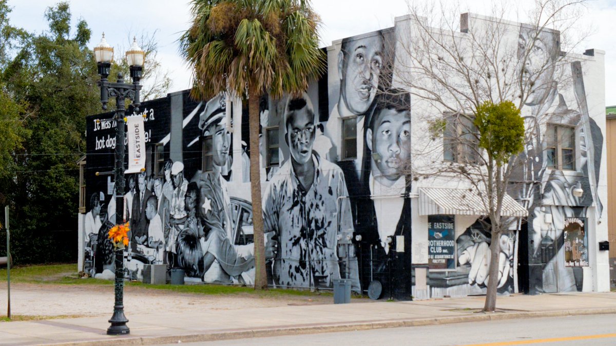 LiftJax's tweet photo. This Saturday, we remembered one of the most tragic days in Jacksonville history: #AxHandleSaturday. You may have seen the mural in the Eastside depicting the day through a collage of imagery - learn more about the most famous part of it: https://t.co/h0anuqJUhd https://t.co/zpq1tLD5hR