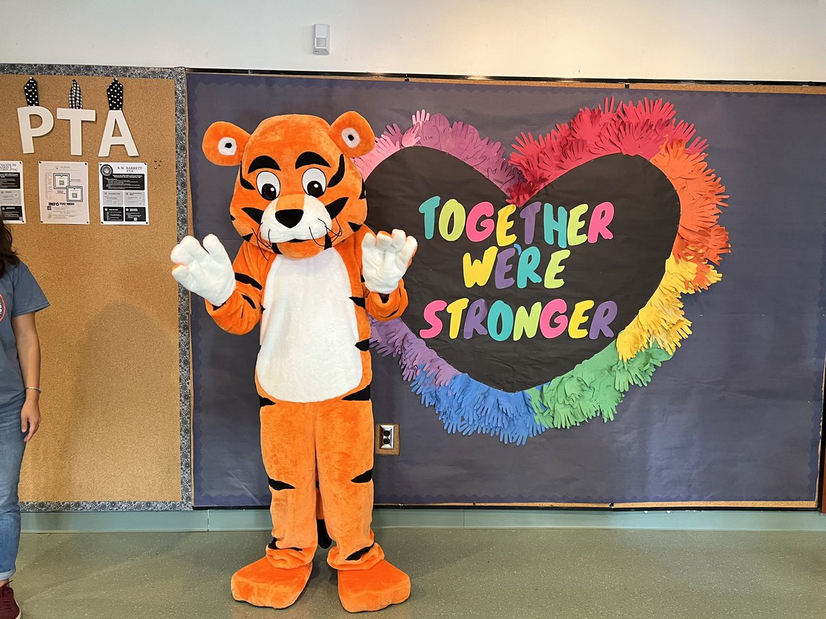 What fun for Stripes, the Barrett tiger mascot, to greet students on the first day of school #KWBPride #APSBack2School
