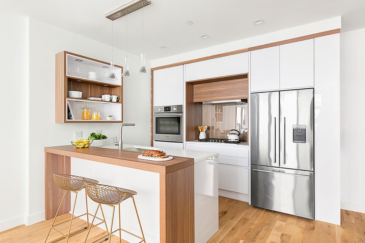 If you are thinking about walnut &amp; white kitchen cabinets for your next project, you might want to take a look at this stunning kitchen design by #LEICHT W|G.  Pair walnut with white and stainless steel appliances to achieve a truly unique look. 
leichtwestchester.com/kitchens/proje…