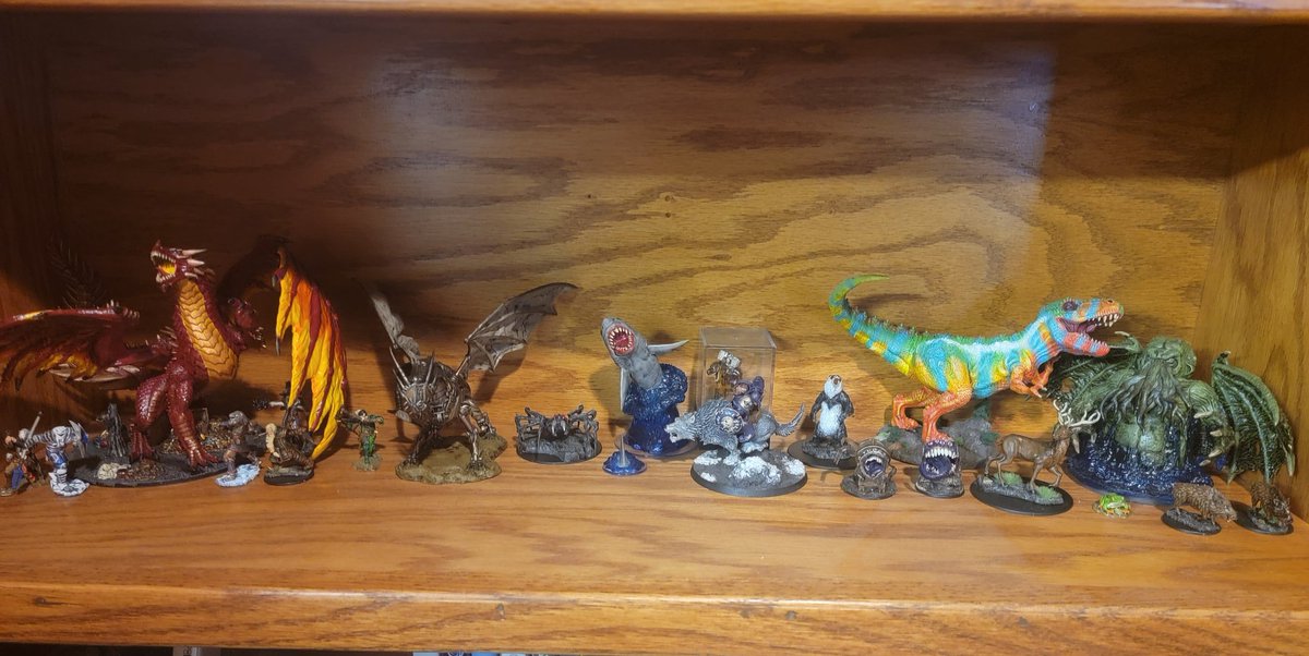 Wolfsythen's tweet photo. Did some rearranging and found a better shelf for my painted models but the ratio of painted models to unpainted models makes me sad I should really start painting again #dndminiatures #miniatures #paintingminiatures https://t.co/GHu7rXzXJ3