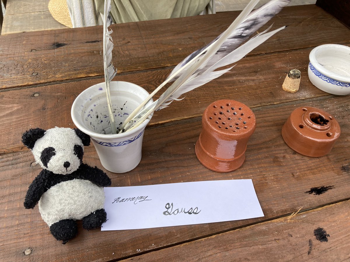 Adventure_Gauss's tweet photo. On Saturday I got to go to the 18th century market! I met a friendly water animal that was taking care of a treasure chest. Then I got to write my name. I forgot to write some math equations too, that would have been fun. @PointeaCalliere #PointeACalliere #ChateauRamezay https://t.co/bXkXW8bxef