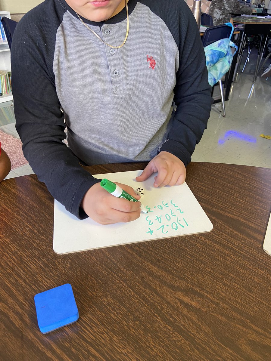 _MsBenavidez's tweet photo. Creating and comparing decimals during small group today. We are constantly building our math and number sense. 📚✏️ #MakeMathGreatAgain #MathMatters #MsBFab5th #RhodesRaptors 💚🦖 https://t.co/gr8u4qwhH0