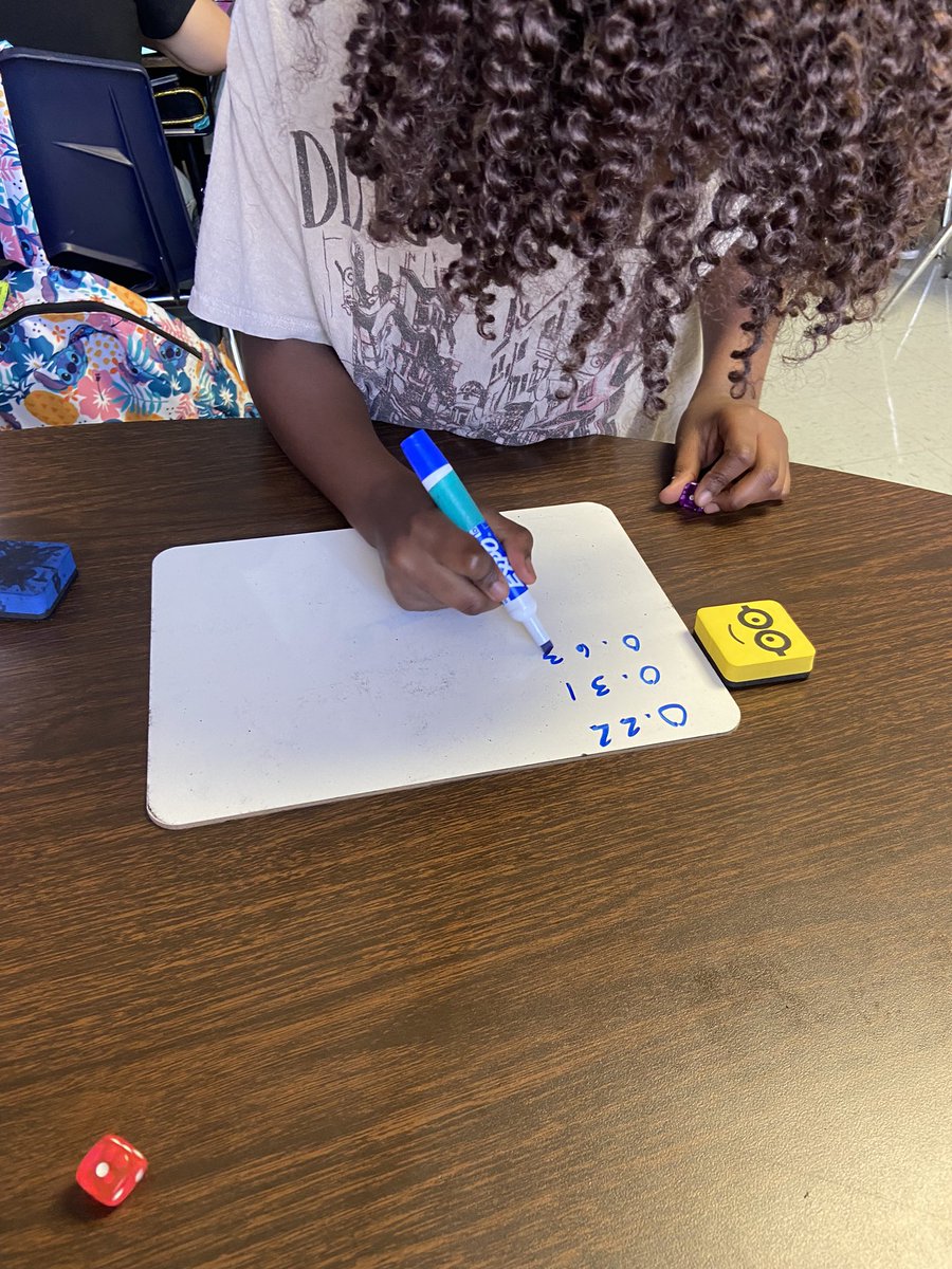 _MsBenavidez's tweet photo. Creating and comparing decimals during small group today. We are constantly building our math and number sense. 📚✏️ #MakeMathGreatAgain #MathMatters #MsBFab5th #RhodesRaptors 💚🦖 https://t.co/gr8u4qwhH0