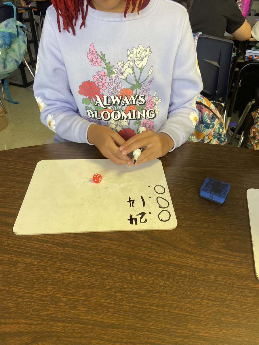 _MsBenavidez's tweet photo. Creating and comparing decimals during small group today. We are constantly building our math and number sense. 📚✏️ #MakeMathGreatAgain #MathMatters #MsBFab5th #RhodesRaptors 💚🦖 https://t.co/gr8u4qwhH0