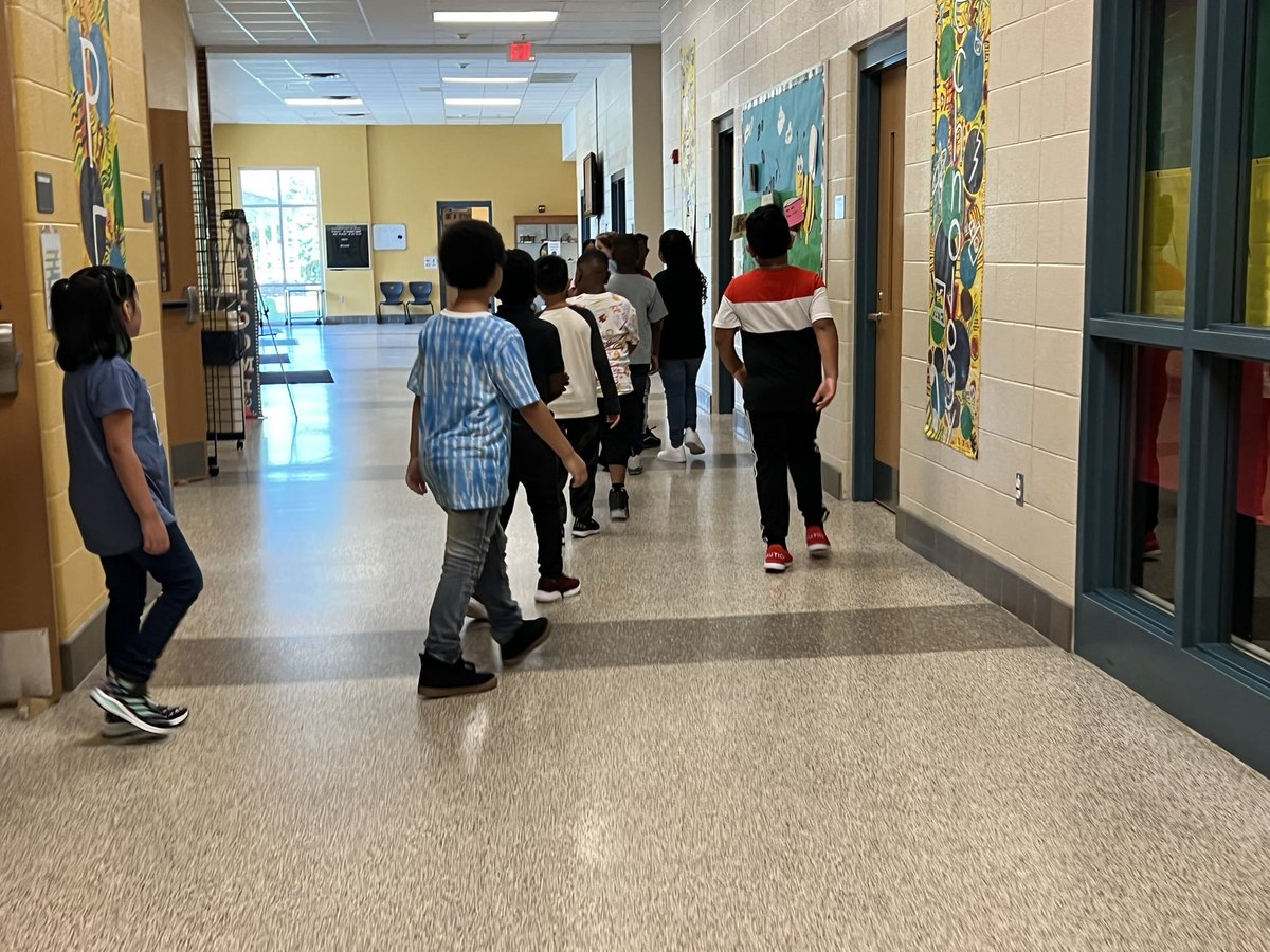 DiggsLatham's tweet photo. We are back! Students were excited to arrive to #TigerNation today, walking down a path of pinwheels spinning in the wind while banners reflected this year’s theme, #SettingtheStageforSuccess, & welcomed everyone to our @AplusSchoolsNC @MagnetSchlsMSA #WSFCSFirstDayPhotos https://t.co/a9EYsGwcNh