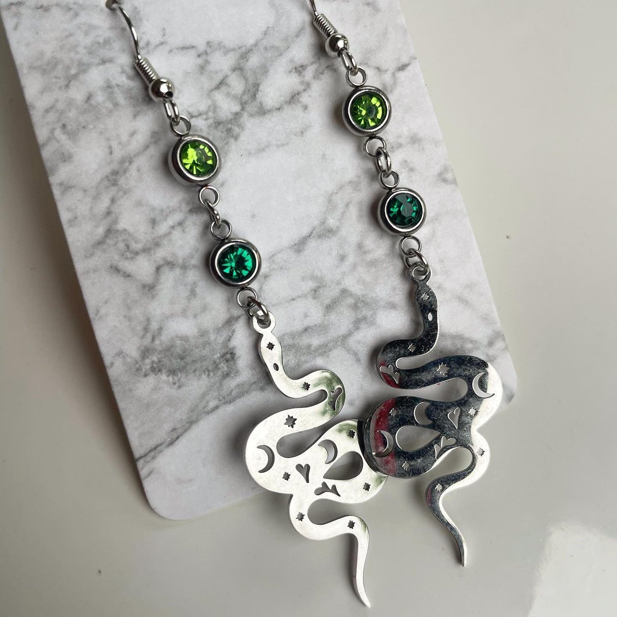 trashcatcreates's tweet photo. the three designs still available from my New Beginnings collection 🐍🍄🌙 I will be restocking the other designs soon! ❣️ 
still available: 
🐍💚Slither On In💚🐍
🌙Growing Through Phases🌑
🍄🖤Wild Magic🖤🍄
https://t.co/AvMGCqETAK https://t.co/F6zmB9uVqC