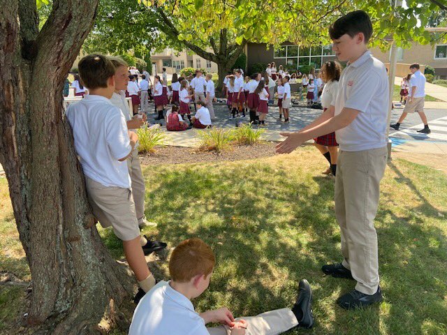 stmschoolatown's tweet photo. #STMspirit Today our 8th Graders met with their 4th Grade Prayer Partners today! They participated in an exciting whole group Rock, Paper, Scissors competition. #STMfun #FirstDayofSchool ❤️🖤 https://t.co/9vCKGCb7uo