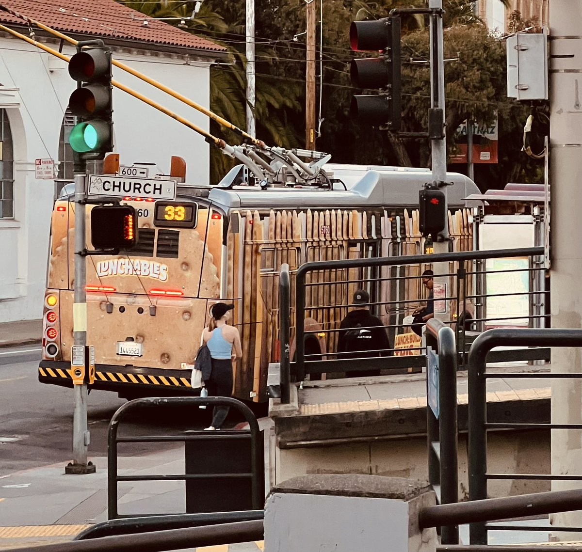 hknightsf's tweet image. Historic San Francisco streetcar and bus wrapped entirely in Lunchables advertising (including the windows!) They don’t make ‘em like they used to…