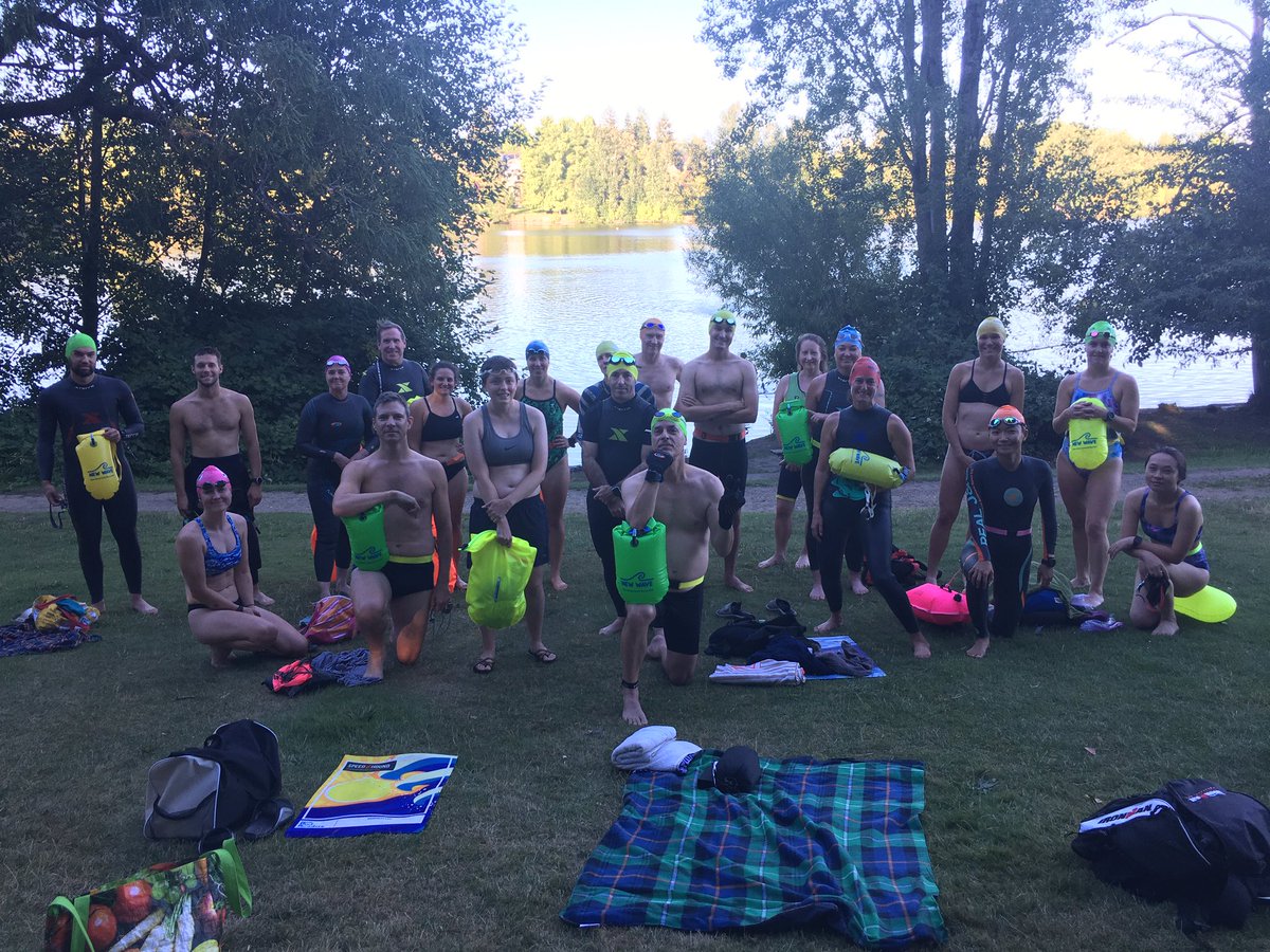 GLOWS!! Great night for a swim at Green Lake! Staying safe with our #NewWave swim buoys!