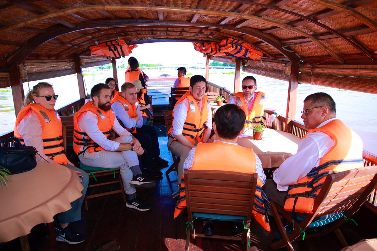 Sam_J_Wood's tweet photo. In the #Mekong with #COP President Alok Sharma and HMA @IainFrew to discuss how 🇻🇳 can best mitigate against #climatevulnerability. PM Chinh’s commitment to achieve #netzero by 2050 will help ensure the resilience and prosperity of Mekong communities. @UKinVietnam 🌎🇬🇧🇻🇳 https://t.co/gNwqx9t9jY