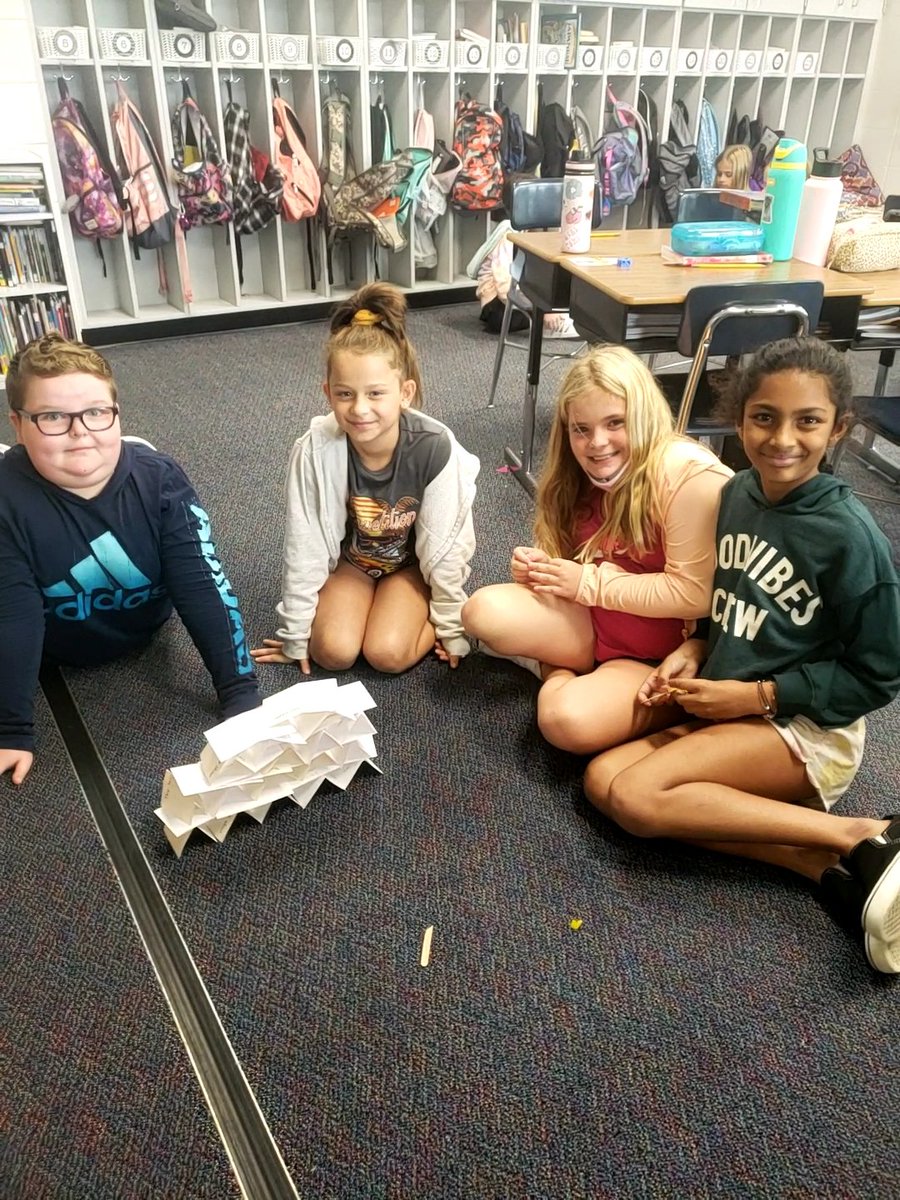 We brainstormed things that scientists do on index cards and then used them for our first STEM challenge