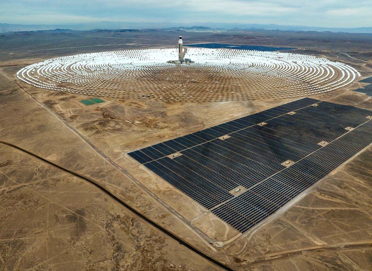 Massive Cerro Dominador concentrated solar and photovoltaic power plant sits atop the Atacama Desert in northern Chile. More than 10,000 mirrors reflect heat to a central tower, in the only such project in Latin America. #gettyimages #gettyimagesnews #renewableenergy