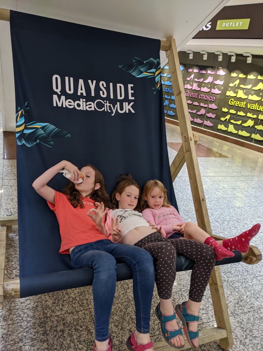 Girls relaxing before getting their school shoes. #summeratQSM