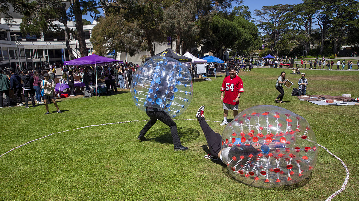 SFSU's tweet photo. Inflatable bumper ball battles on the Quad! #GatorFest #SFSU https://t.co/d3ocwjzfZk
