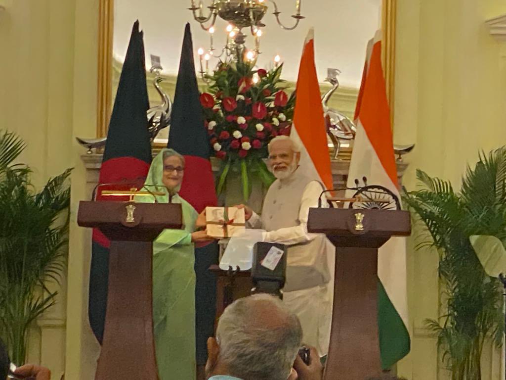 BINABISWAS's tweet photo. This is the best news I can share, feel proud for a Coffee Table Book on Bangobondhu Sheik Mujibur Rahman by Rubric Publishing is launched by the power house prime ministers of India and Bangladesh #PMModiji #PMSheikHasina ma’am 
#ThamizachiThanapandian #shashitharoor https://t.co/EGFBqJS79d