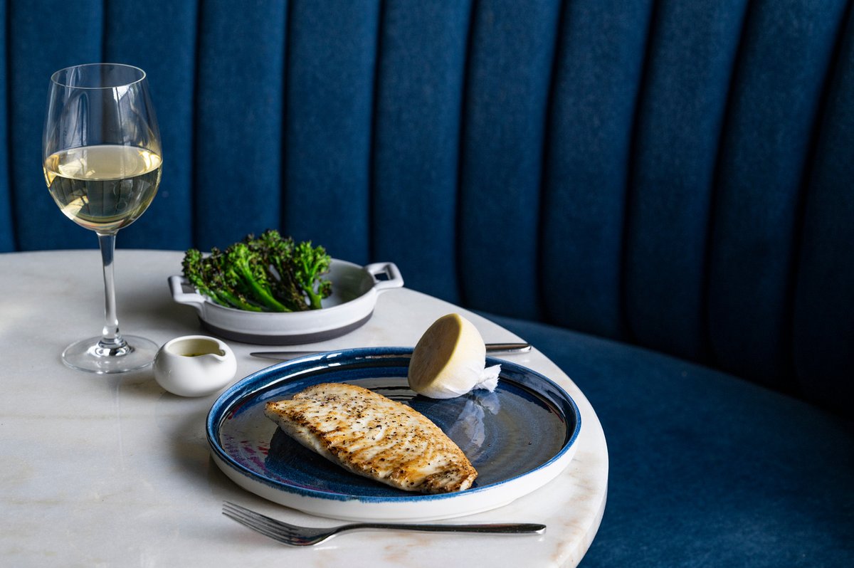 crokeparkhotel's tweet photo. In The Hawthorn, locally-sourced deliciousness is kissed with flames on the grill, and served with refined simplicity. Like this market fish of the day: grilled turbot, served with lemon &amp; caper butter, and fresh greens - perfect with a crisp Chardonnay. https://t.co/o1XzYFS7T5