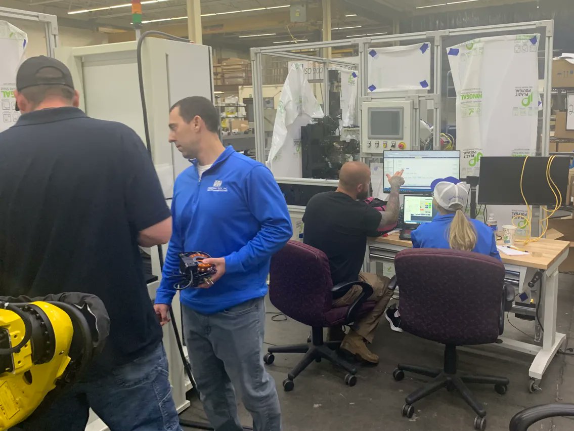 When you work with Industrial Tool, Inc. you can be assured that we have the experts in house! See this group of mechanical, robotic and applications engineers collaborating to make sure every detail of this build is flawless!