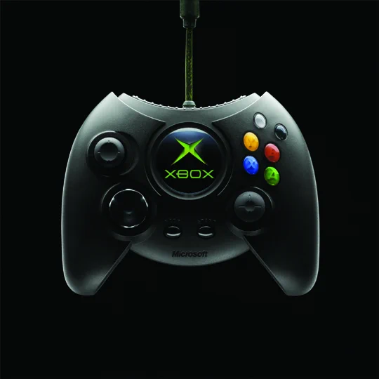 The original Xbox controller on a black background