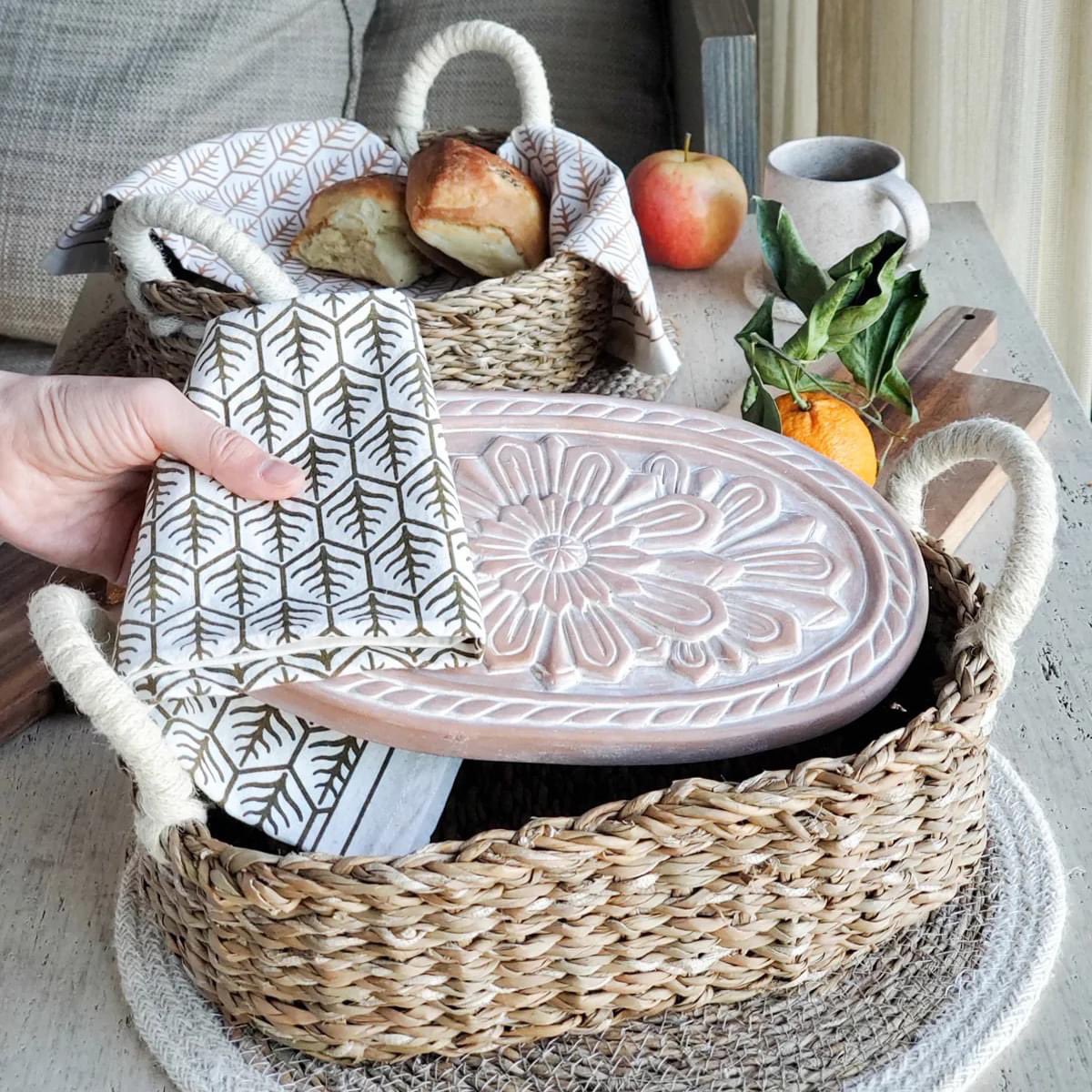 J_Schrecker's tweet photo. An oval woven seagrass bread basket with handles fitted with a terra cotta warming stone in a floral design.  

See this nifty little bread basket and more in store or shop our website at https://t.co/DTsmBs9w6z

Store Hours:
Monday-Friday 9:30-5:30
Saturday 9:00-2:00 https://t.co/XOLdWcUXGe