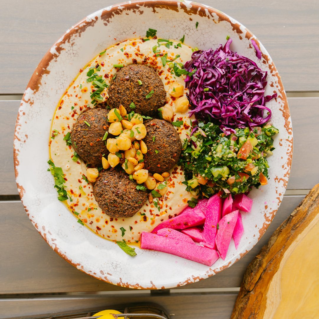 NEW MENU ITEM: Hummus Bowl 

We have added a new base option for your bowls! In addition to rice and salad you can now choose our creamy hummus as your base. Pick from our proteins of chicken, beef, falafel, or lentils to complete your bowl.