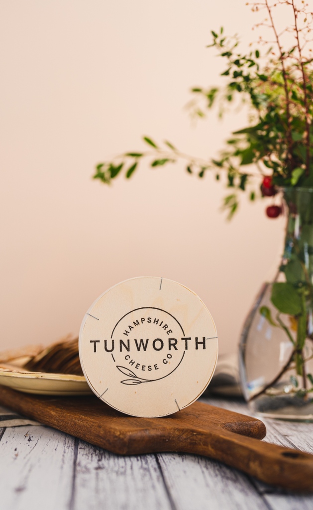 Why is our Tunworth in a box?
In 1890, an engineer, M. Ridel, devised the wooden box that is used with most Camembert style cheese.
It was designed to help send the cheese across longer distances, in particular to America, where Camembert became very popular. 
#tunworth