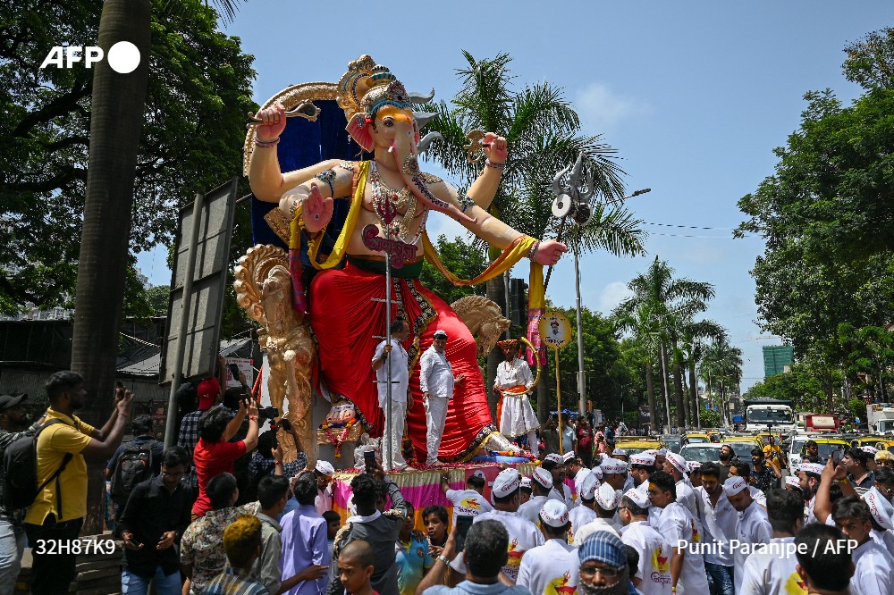 AFP News Agency on Twitter "Workers caked in plaster are putting the