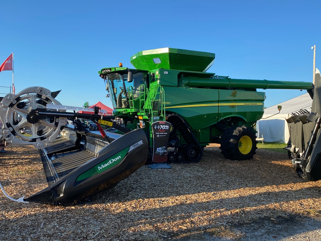 MacDon's tweet photo. Set up and ready for Day 1 of this year's @FPShow in Boone, IA. We've got plenty to see including the all-new FD2 FlexDraper, C Series Corn Header, M1 Windrowers, R1 Pull- Type, R2 Disc Mower, and more! Find us today until Thursday at lot number 21S. #FPS22 https://t.co/ZYa4SMq5Ox