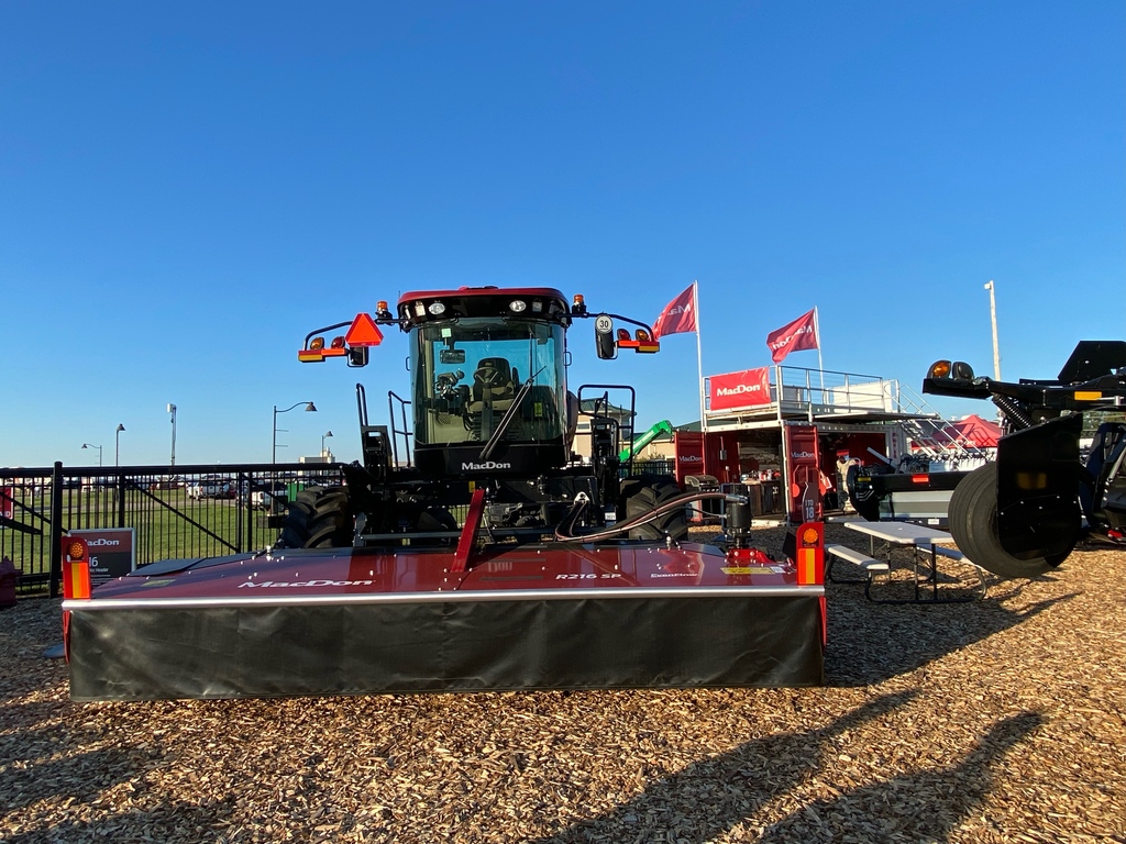 MacDon's tweet photo. Set up and ready for Day 1 of this year's @FPShow in Boone, IA. We've got plenty to see including the all-new FD2 FlexDraper, C Series Corn Header, M1 Windrowers, R1 Pull- Type, R2 Disc Mower, and more! Find us today until Thursday at lot number 21S. #FPS22 https://t.co/ZYa4SMq5Ox