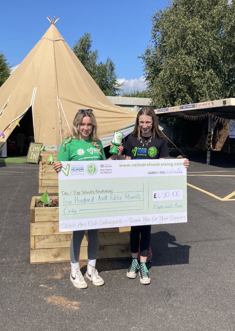 RollsMarsha's tweet photo. Freya and Ava presenting a cheque to Velindre from their fundraising@Velindre_YA @Velindre 💚 https://t.co/p3M0wVhJz5