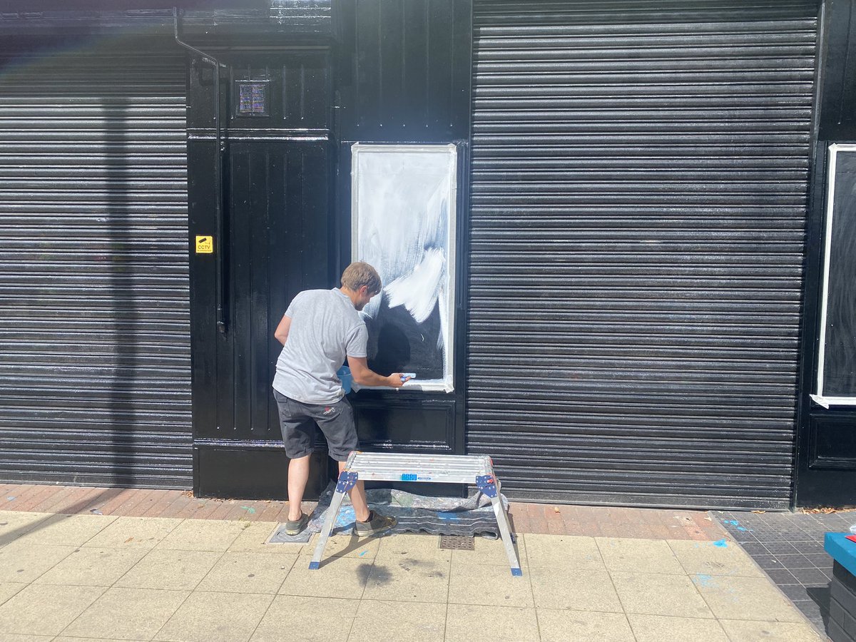 danieldaviesRPL's tweet photo. Our local artist @JoeForrestArt is painting some old #NewBrighton images on the pharmacy and post office on Victoria Road. Full steam ahead now with many murals going up in &amp;around the Victoria Quarter @J___Williamson @MetroMayorSteve the Rockpoint Regeneration is back in action https://t.co/yuEFJyCSGA