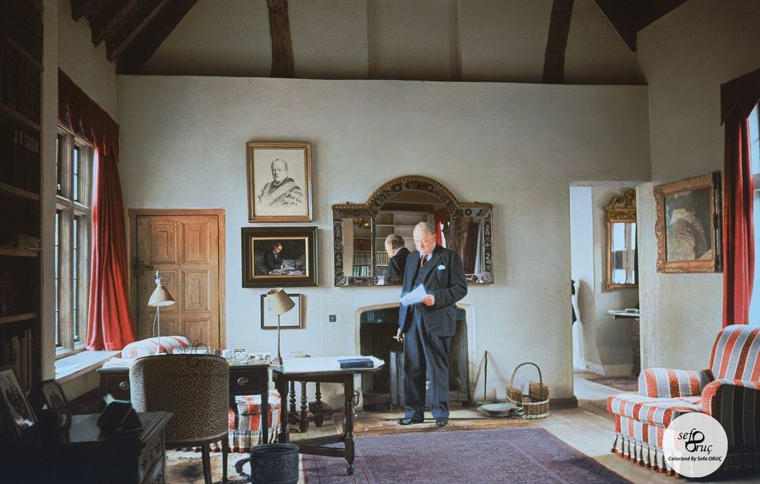 Winston Churchill photographed in a room at his home, Chartwell, which is a country house near Westerham, Kent, in South East England. 

Credit: <a href="/orucsefa19/">socolorization</a>
historycolored.com
#history #churchill #uk #winstonchurchill