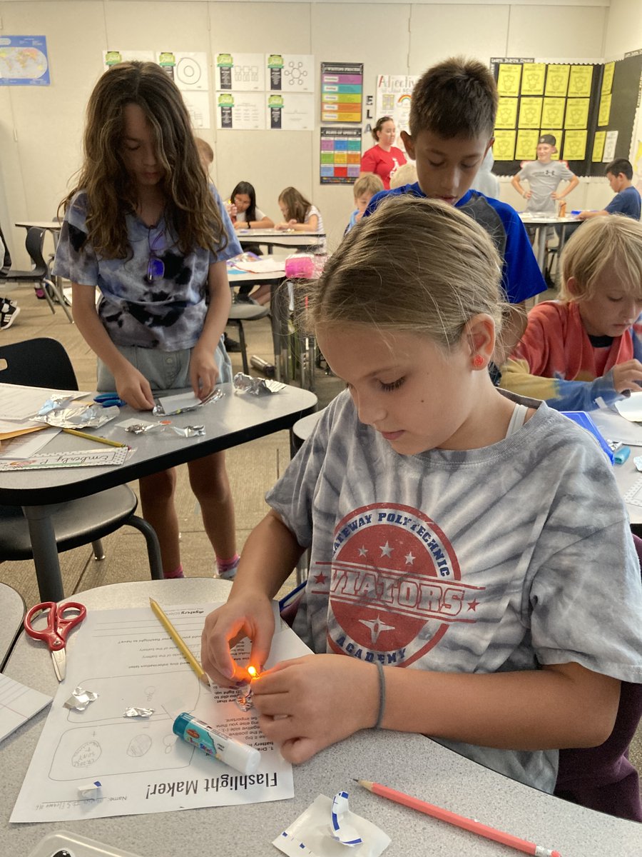 qcsciencecoach's tweet photo. 4th grade students @GPA_Aviators learned about circuits by building their own mini flashlights using supplies donated by @mcschoolsup STEM resource center!  Take a moment to look at the intense concentration on these students' faces!  @QCUSD_AVID strategies are evident! https://t.co/e3mt9F6ZPu
