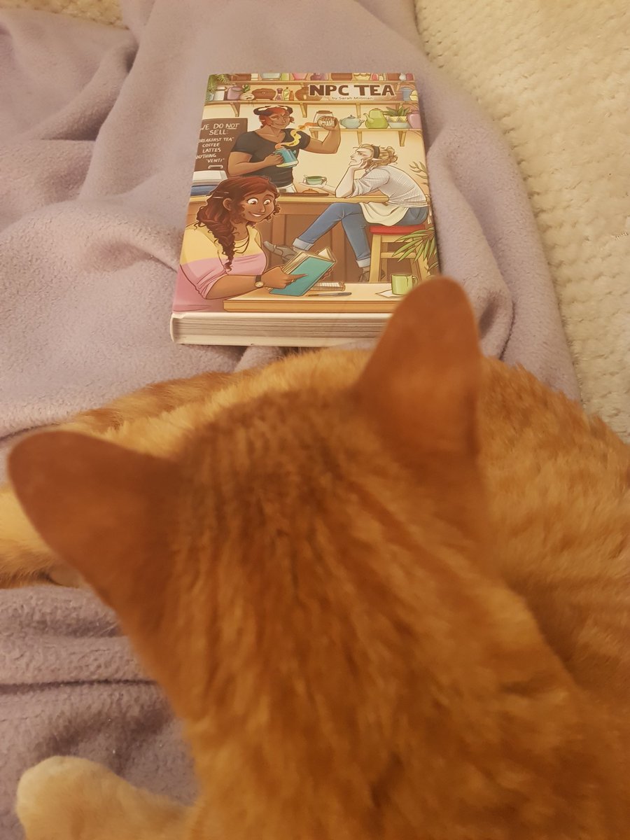 Having a cosy night in with Beans and NPC Tea from <a href="/milmocomics/">Milmo ☕✨🏳️‍🌈</a> ahead of <a href="/PrideCaf/">PRIDE COMIC ART FESTIVAL - 🌈</a> this weekend. Excellent and just what I needed honestly. 

@thischucklehead made a good call picking it up last year 😁 (the book, not Beans - though he was a good shout too)
