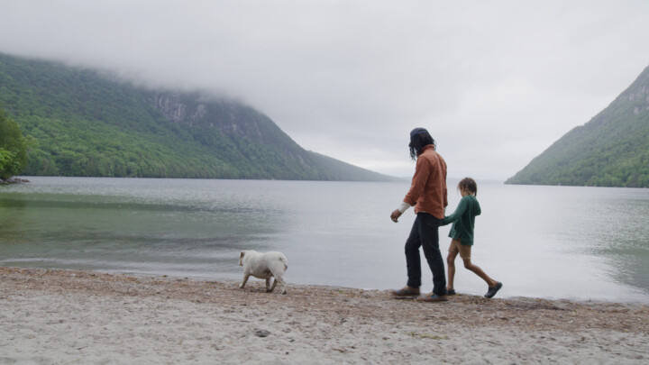 Relax lakeside near fjord-like mountains at a Vermont beach, where you can rent boats or stand-up paddleboards, enjoy ice cream and local snacks from food trucks, swim, dive, and camp nearby. #NationalBeachDay #ThisIsVT
