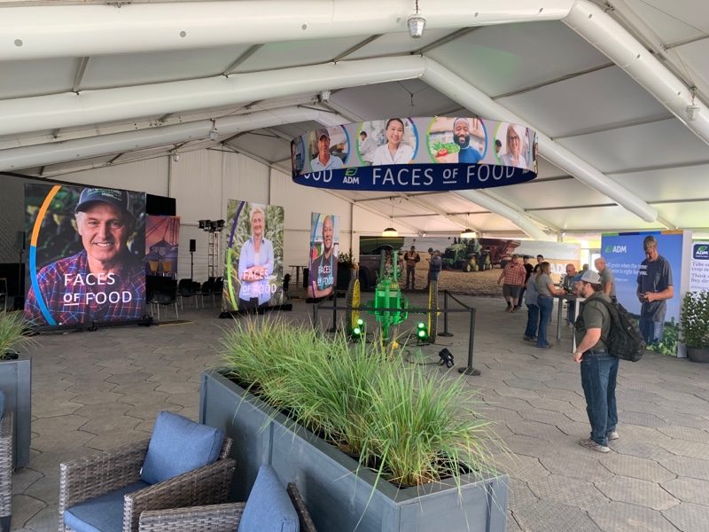 ADMFarmServices's tweet photo. It's the official first day of #FPS22! Stop by tent 1126 to grab coffee, see a vintage tractor, enter to win a giveaway & snap a photo in our cutout wall representing one of our latest programs: Faces of Food. Stay tuned for more about our latest works.
#facesoffood #ADMatFPS22 https://t.co/5B2cFOgsNh