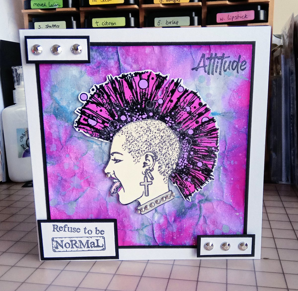 by_maxine's tweet photo. I LOVE her!!!! 
My Visible Image stamp from the 'Refuse Normal' set. Beautiful! 
Distress inked background with pearlescent paint splatters. Just stunning!!
😊💛

#HandcraftedByMaxineB #VisibleImage 
#ChooseHandcrafted #RefuseNormal #Punk 
#Mohican #Pink https://t.co/HopbvyyWDc