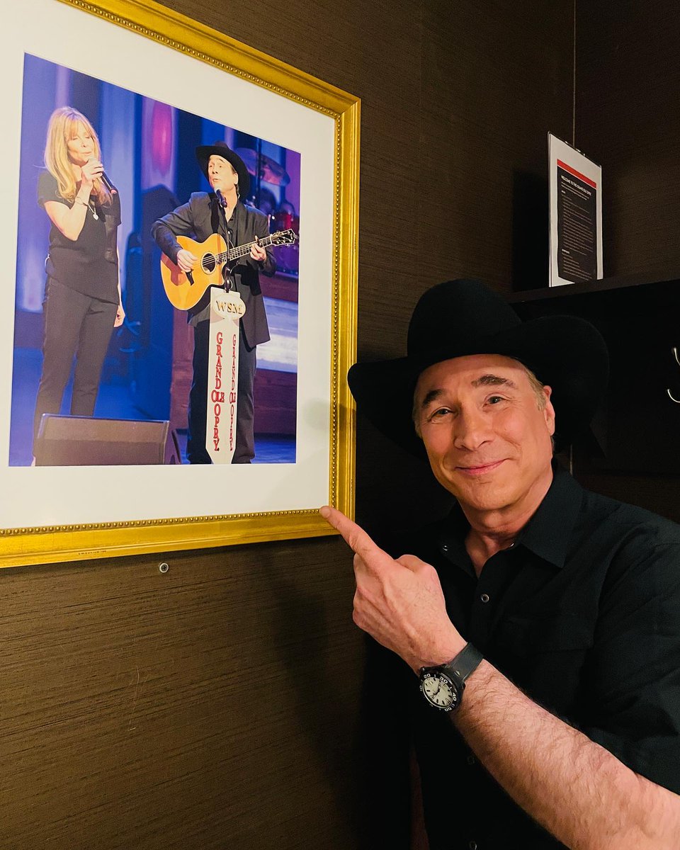 Clint_Black's tweet photo. Look what I found backstage at the @opry! Can’t wait to take the Mostly Hits and The Mrs. Tour back on the road this Fall. Did you get your tickets yet? https://t.co/Q2gZmSZHIV https://t.co/0suGhnyP42