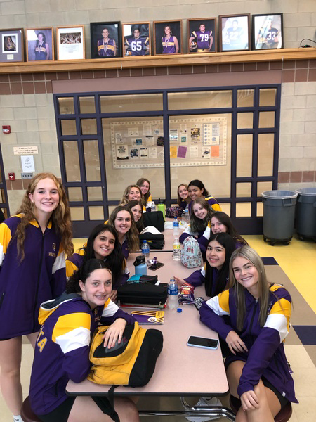 These Spikers are ready for the Game tonight! Sporting their new warm-ups 💜💛🏐