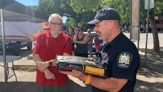 AlbertaSPCA's tweet photo. Handing out free cat and dog food at the Bowman Arts Centre in Lethbridge today until 3pm.  Big line up to start the event.  Thank you to @nestlepurinapetcare for supplying the food.

#lethbridge #yql https://t.co/pogCX7rxh6